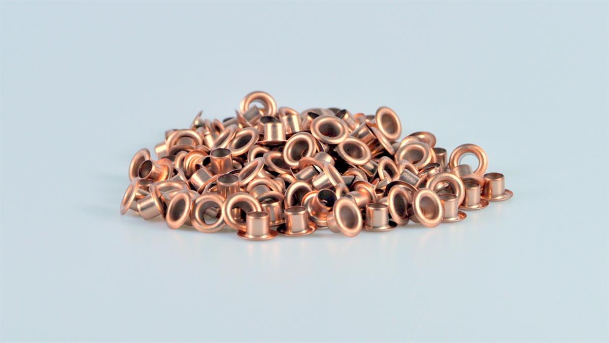 Farbliche Lackierung von Metallösen - Trommellackierungen bei Rotover